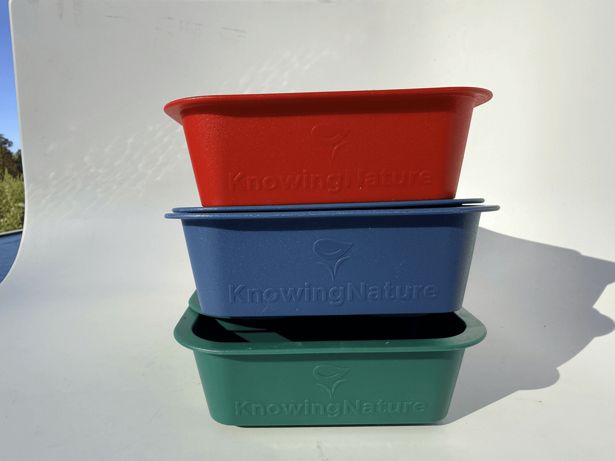 Knowing Nature Windowsill Self-Watering Microgreens Tray for indoor gardening, with lush microgreens growing in the tray.