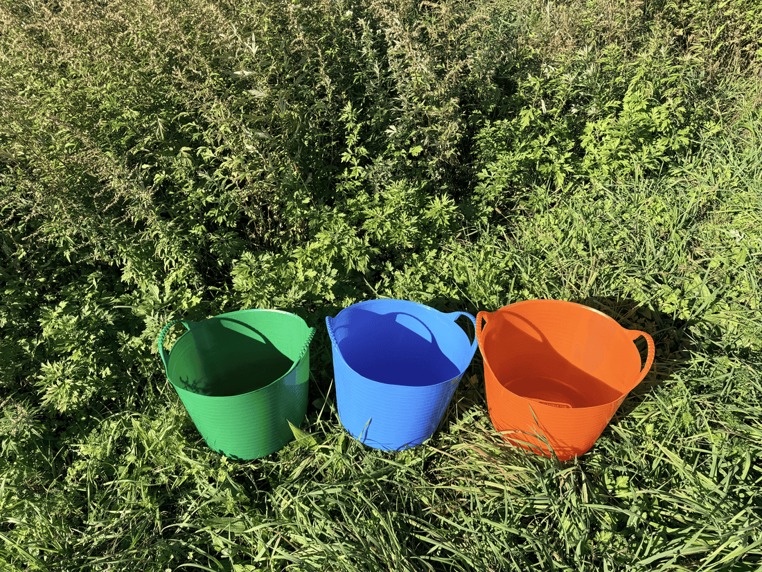Red Gorilla 6.9-gallon garden tub shown with sturdy plastic container for gardening and plant watering tasks.