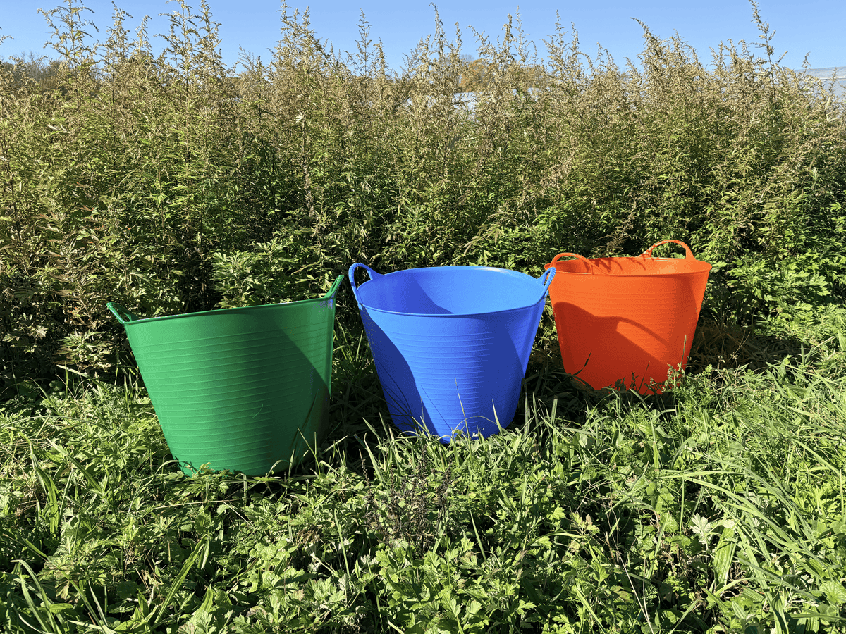 Red Gorilla 10-gallon garden tub for tools and supplies, durable plastic container with handles, ideal for gardening and storage.